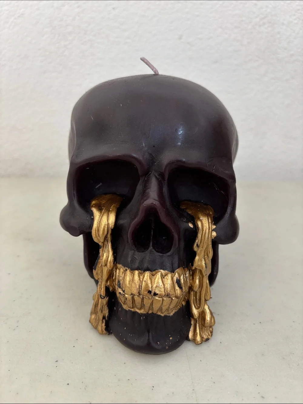 New - Dark Brown Skull Candle with Gold Drip Accent